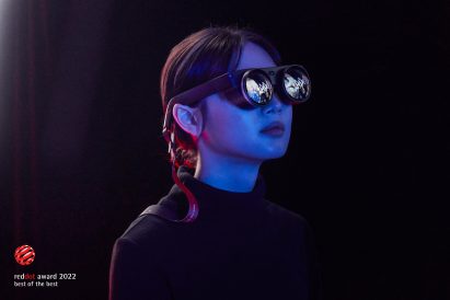 Photograph of person wearing goggles in a dark space