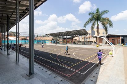 Court outside Kampala Community Centre by Kéré Architecture