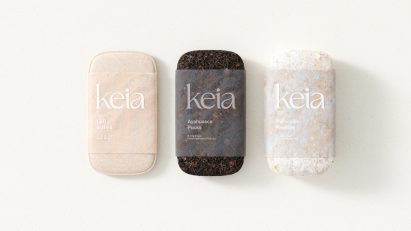 Rendering of three different Keia products: LSD Wafers in light pink wheat-based packaging, Ayahuasca Pucks in dark brown leafy packaging and Psilocybin Pastilles in white flecked mycelium packaging for microdosing