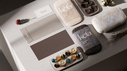 Rendering of a flatlay of several packages by Layer in muted earth tones sitting on a table