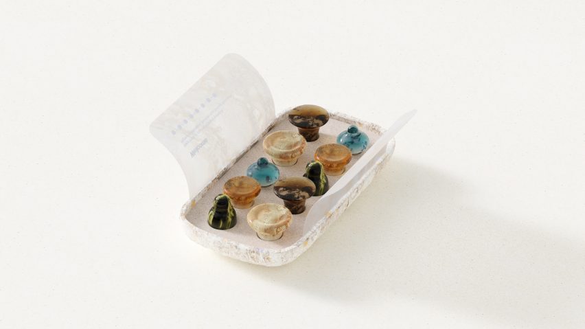 Rendering of open Keia Psilocybin Pastilles packet showing 10 marbled gummie sweets in different shapes
