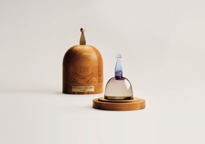 A rounded perfume bottle and case