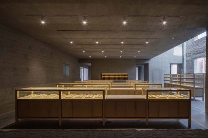 Pastry display cases inside concrete room