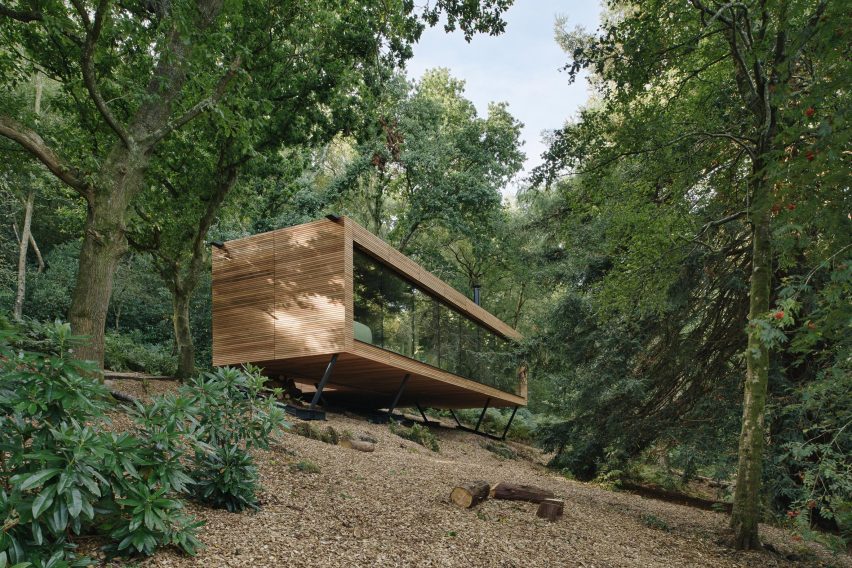 Wooden lodge in forest