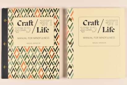 Book spread with geometric cover