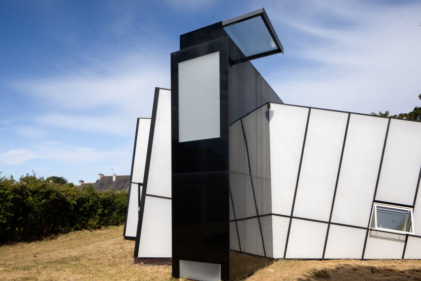 Monochrome exterior of Maison de Verre by Studio Odile Decq