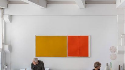 Interior image of an architecture office in Munich with art hung on the walls