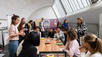 Professors and students in a seminar at Bern Academy of the Arts