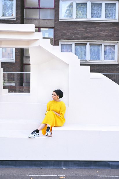 Sumayya Vally of Counterspace sits in her Notting Hill Carnival pavilion