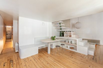 Dining area of Palau apartment by Colombo and Serboli Architecture