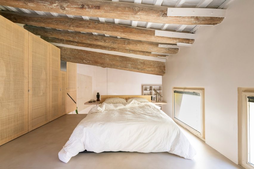 Bedroom interior of Palau apartment by Colombo and Serboli Architecture