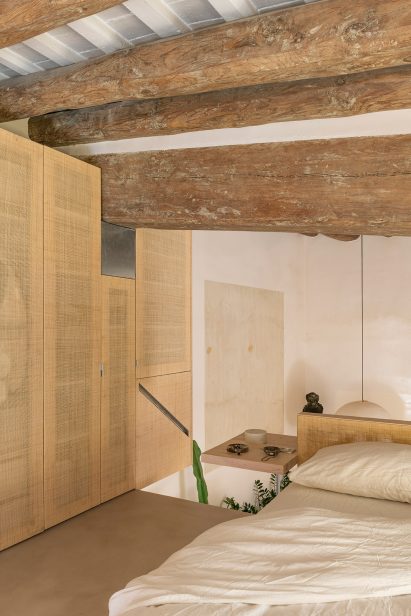 Bedroom interior of Palau apartment by Colombo and Serboli Architecture