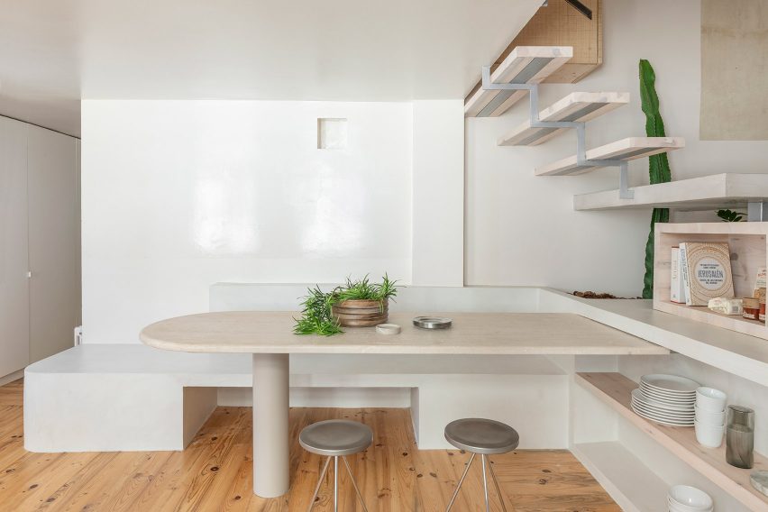 Dining area of Palau apartment by Colombo and Serboli Architecture