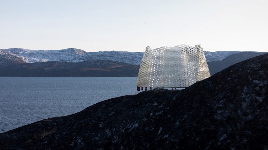 Qaammat pavilion by Konstantin Arkitekter on a rocky hillside overlooking a lake
