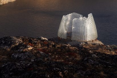Qaammat pavilion by Konstantin Arkitekter on a rocky hillside overlooking water