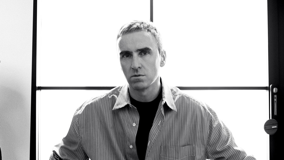 A headshot of designer Raf Simons
