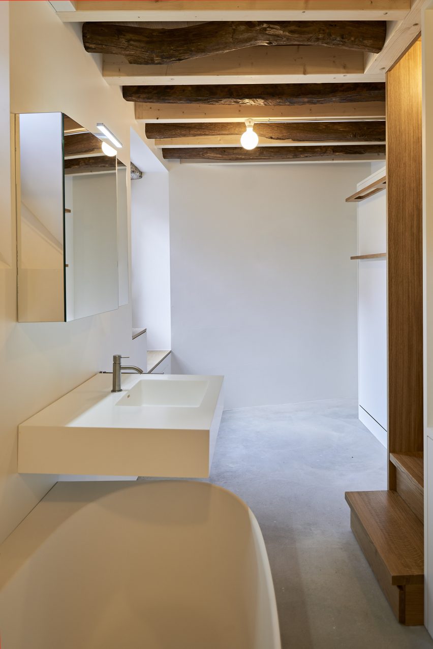 Bedroom and bathroom in Rustic Renovation by Enrico Sassi