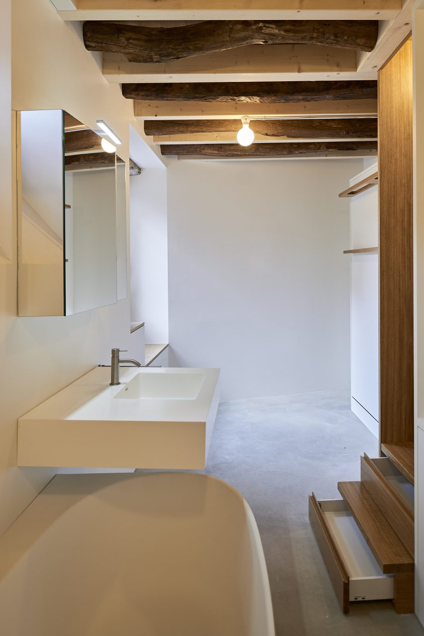 Bedroom and bathroom in Rustic Renovation by Enrico Sassi