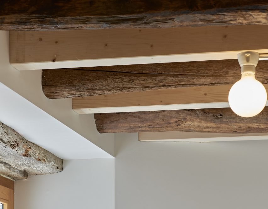 old and new wooden joists supporting the first floor