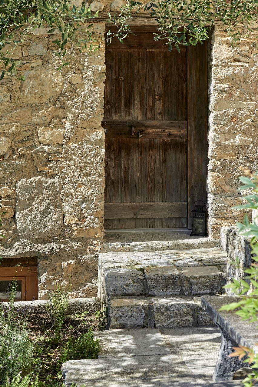 Entrance to Rustic Renovation by Enrico Sassi