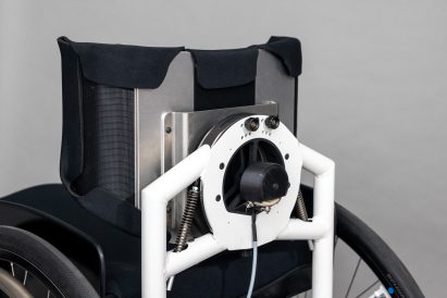 The back of a wheelchair with a bearing