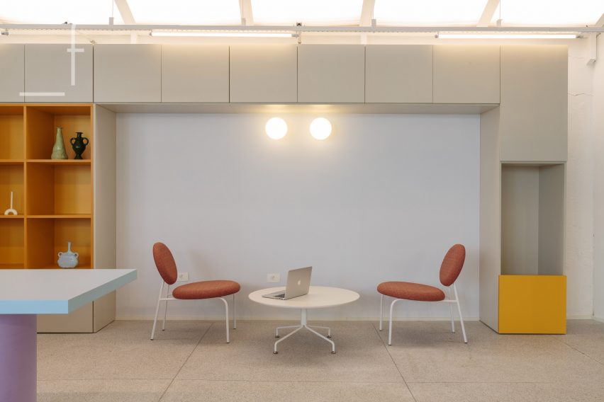 Pair of chairs and table in wall niche