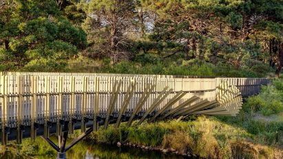 Dezeen Debate features Sam Crawford Architects’ “broken” eel-shaped bridge in Sydney