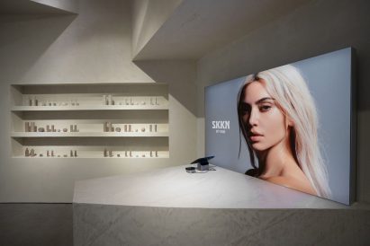 A portrait photo of Kim Kardashian in a store