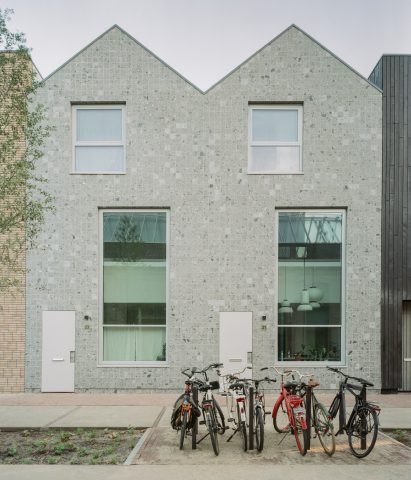 Image of a pale green tiled building at Wisselpoor