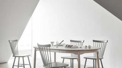 Stolab's solid-wood dining chairs arranged around a dining table