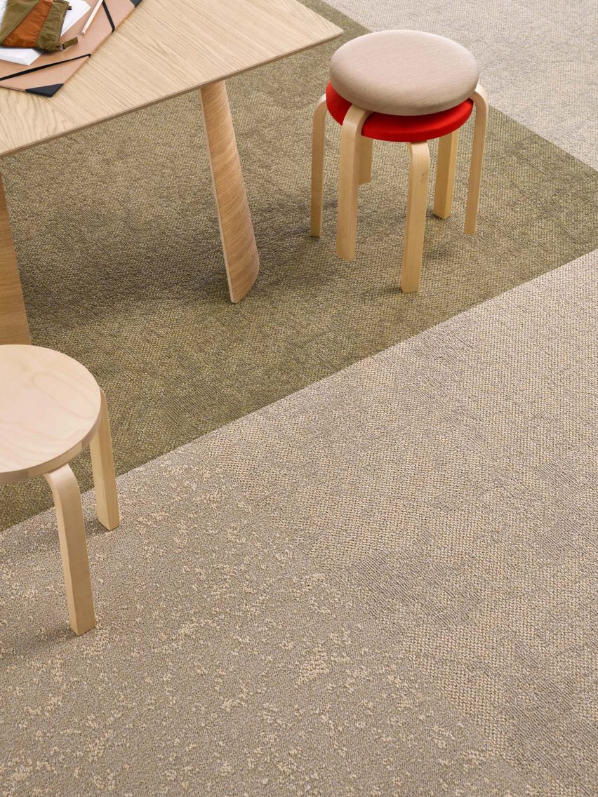 Photograph of beige and sage green carpet beneath table
