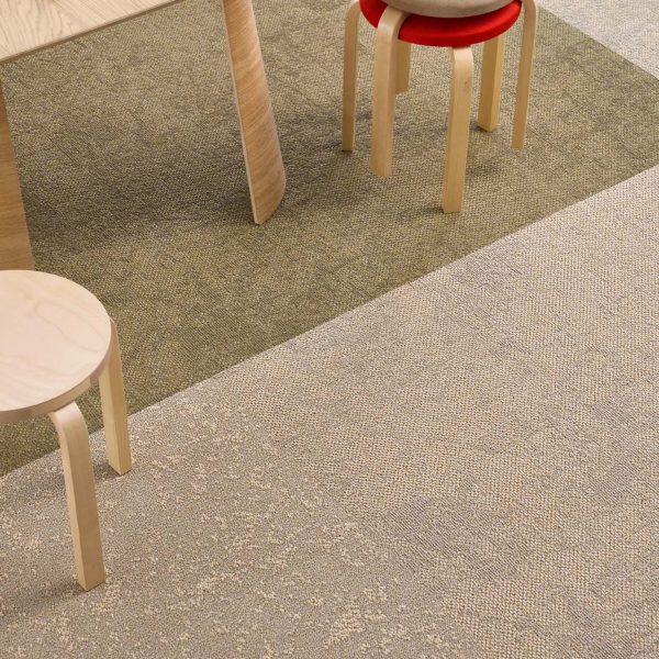 Photograph of beige and sage green carpet beneath table