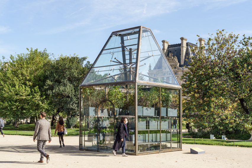 People walking in front of The Green Pavilion in Paris