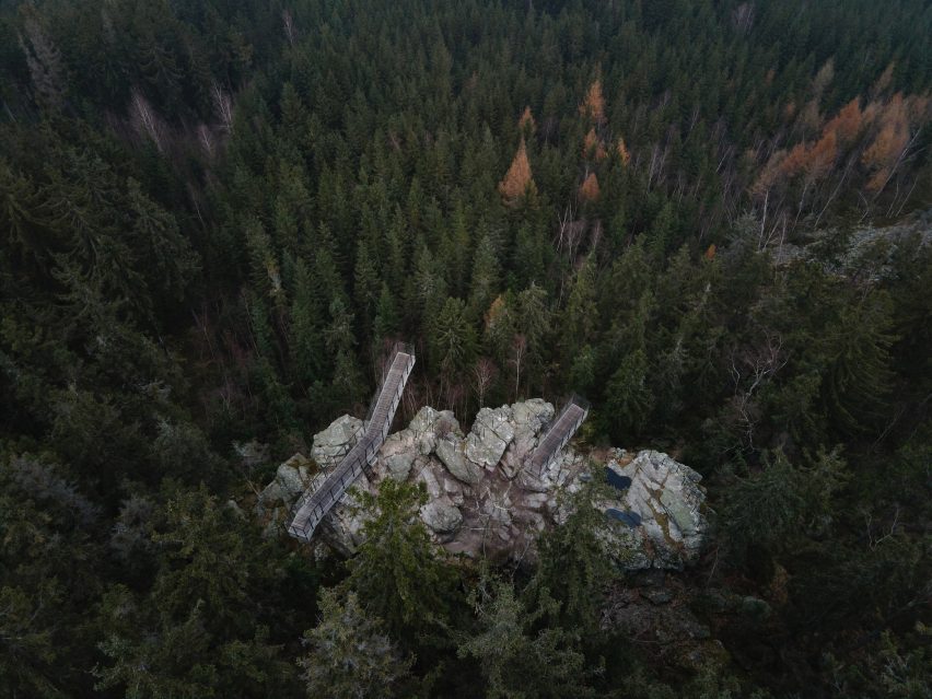 Watchtowers on a cliff in a forest