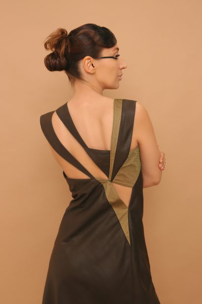 Bartlett whistleblower Eleni Kyriacou wearing Time to Rebuild garments