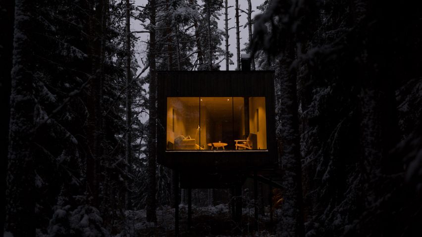 Night view of Trakt Forest Hotel suite by Wingårdhs
