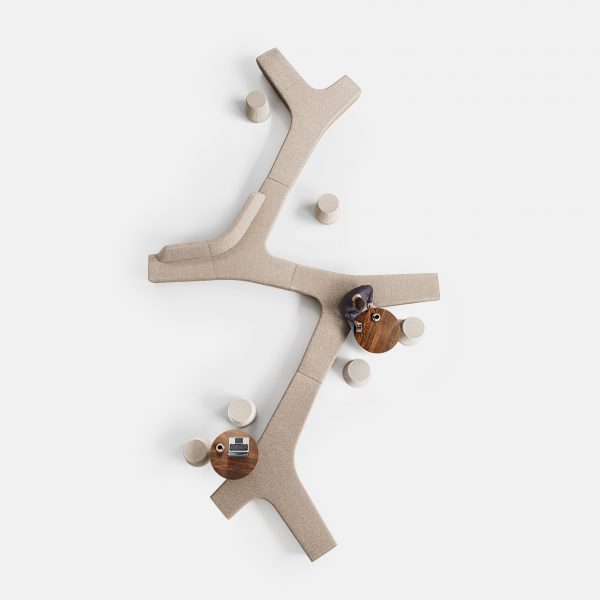 Beige seating on white backdrop from above