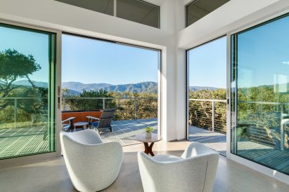Interior view with sliding glass doors and mountains