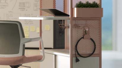 Detail of perforated screen on side of desk