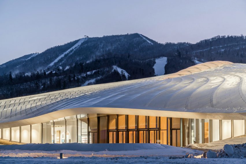 Close-up of conference centre with undulating white roof
