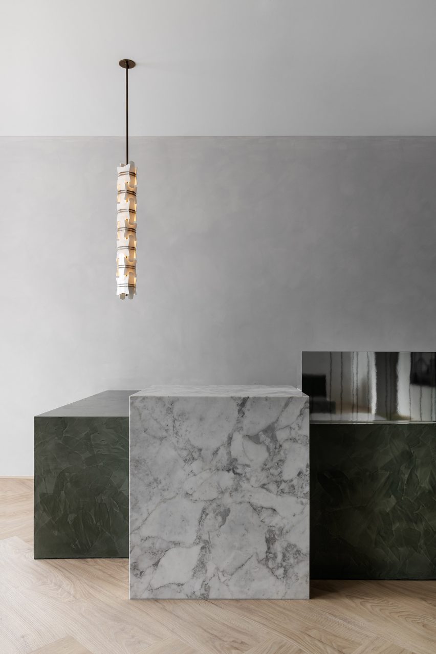 Marble reception desk in Youth Lab 3.0 clinic interior design by Nickolas Gurtler