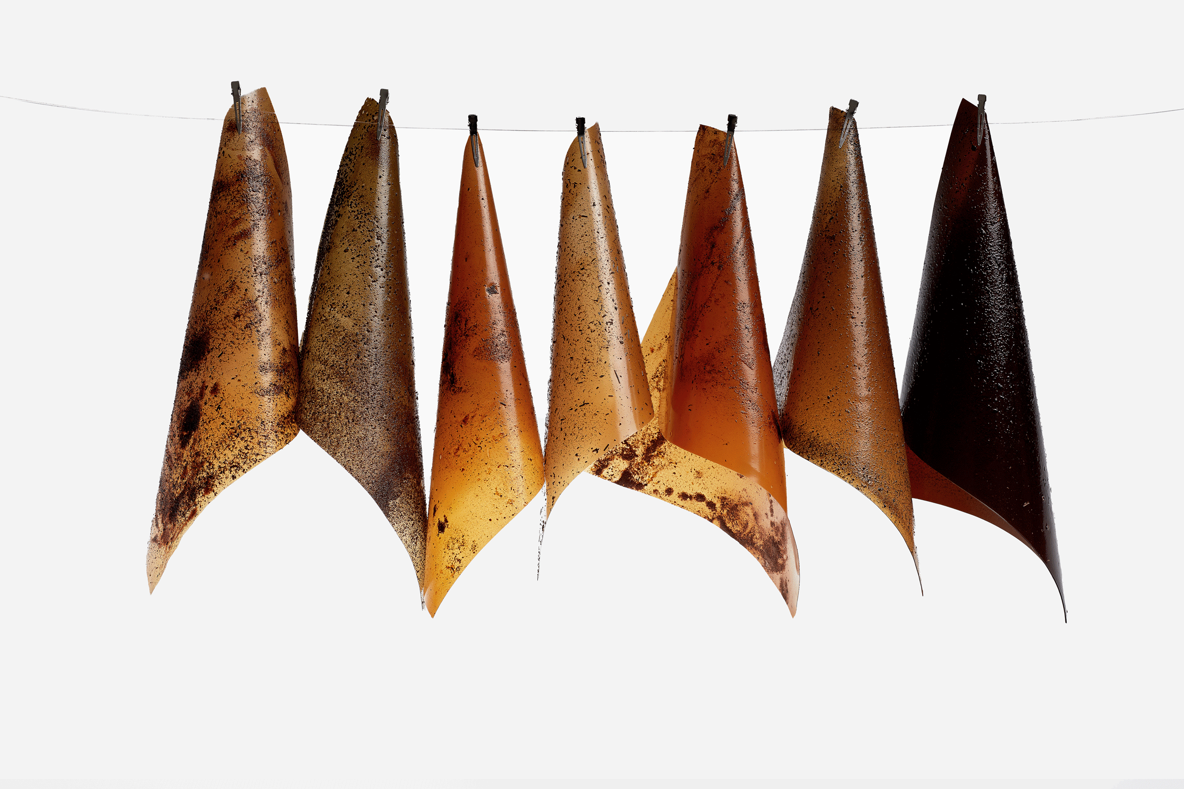 Sheets of soil leather hanging