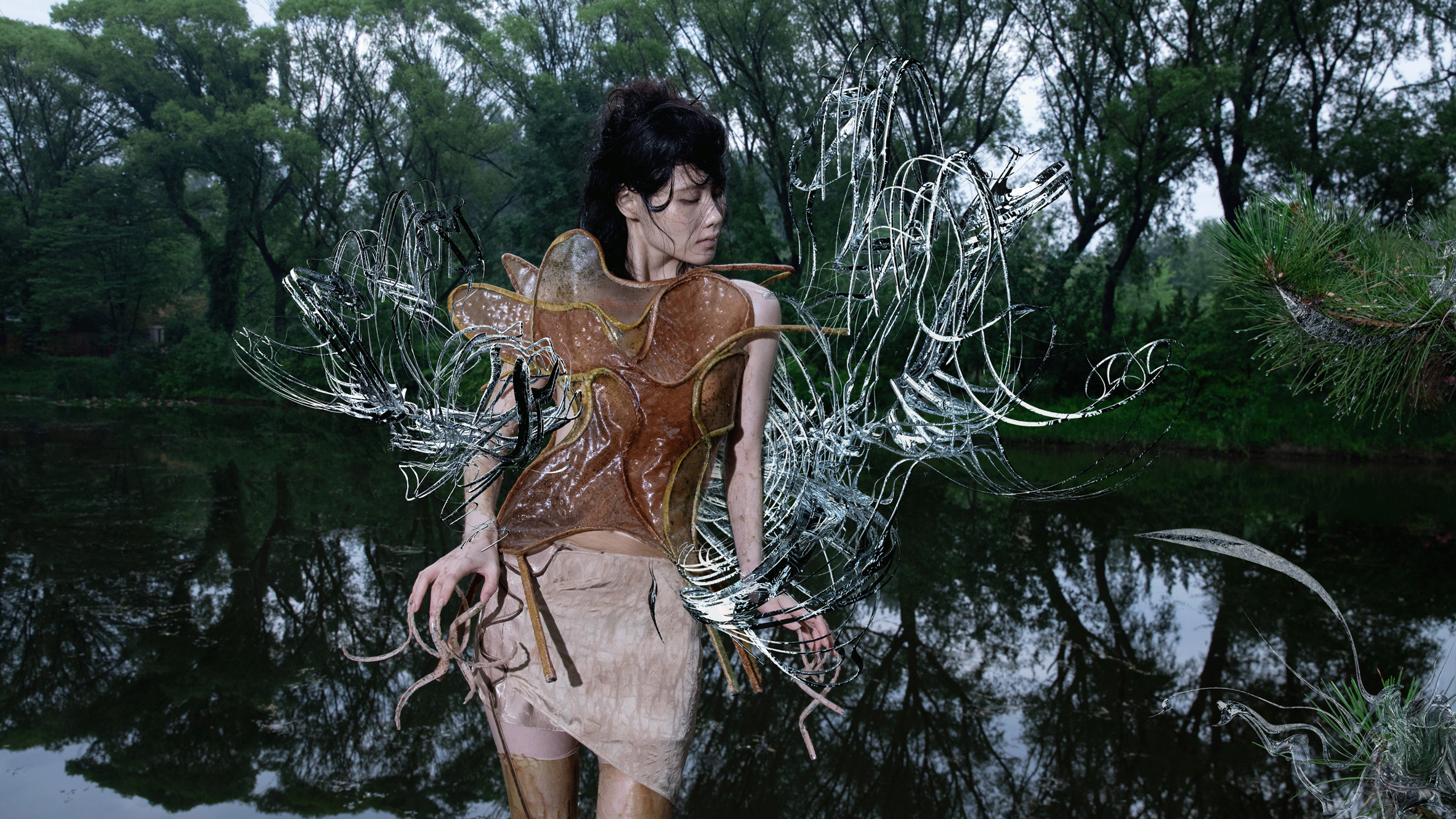 A model wearing a top made from soil leather
