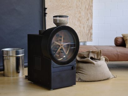 Coffee machine with large circular window on worktop