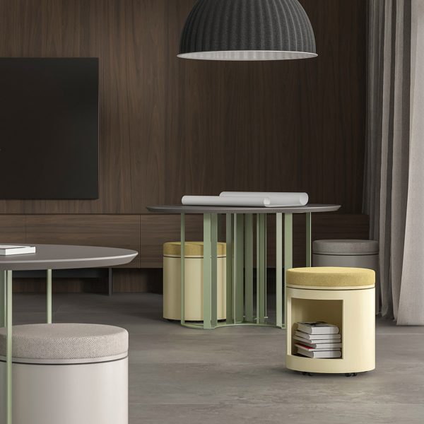Office space with sage green and yellow seating and tables
