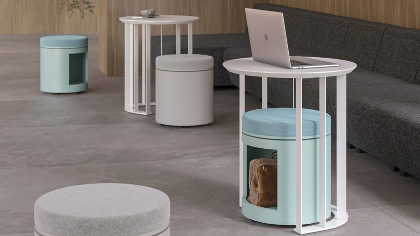 Office space with white and pale blue seating and tables