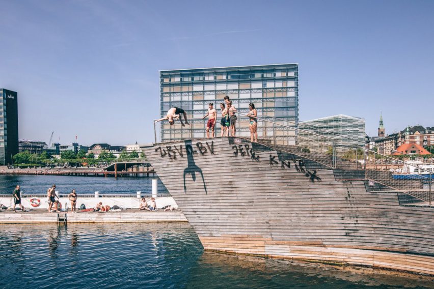 Image of a person diving off a harbour