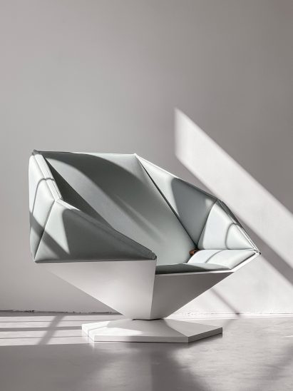 A photo of a grey and white chair