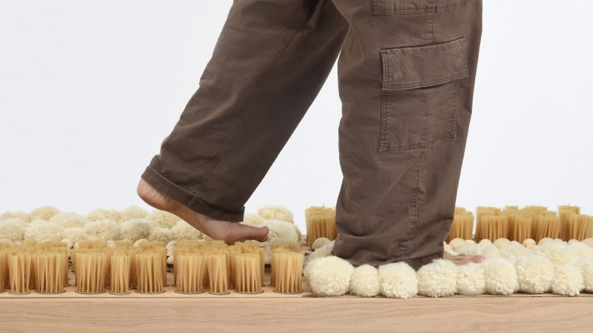 Person walking on composite board