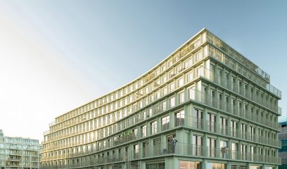Social housing with stepped facade and balconies